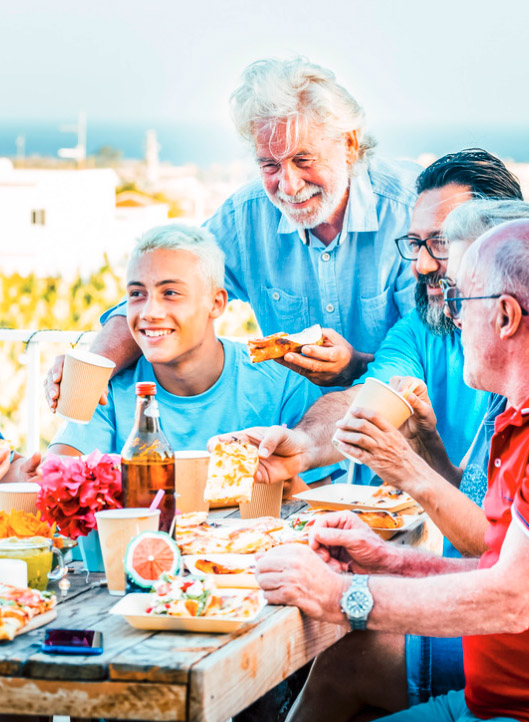 Family enjoying an outdoor Labor Day meal