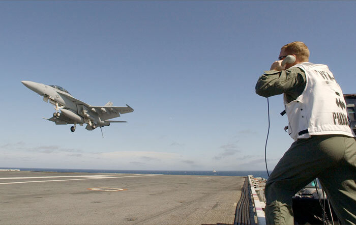 Landing Signal Officer talks F/A-18 down to safe landing